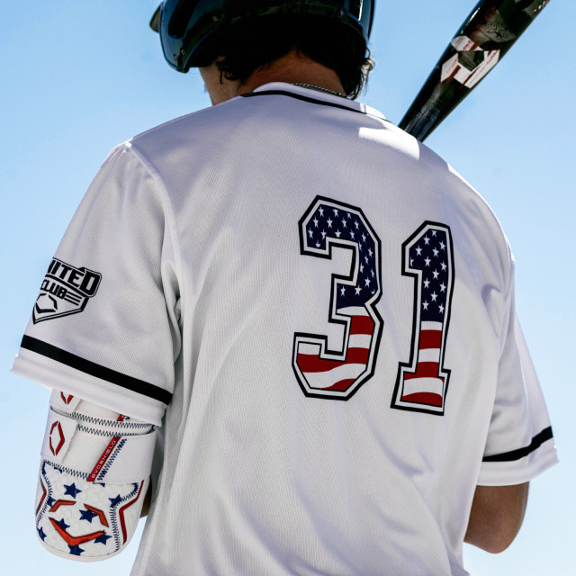 Baseball Player At The Plate Wearing Team.Shop Customized Gear